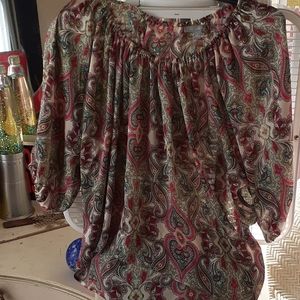 New York Collection Paisley blouse. Hues of red,green and black outline. Size L